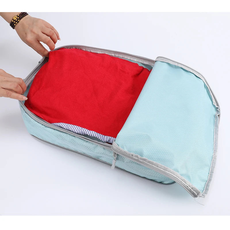 Compressible 4-Piece Travel Bags